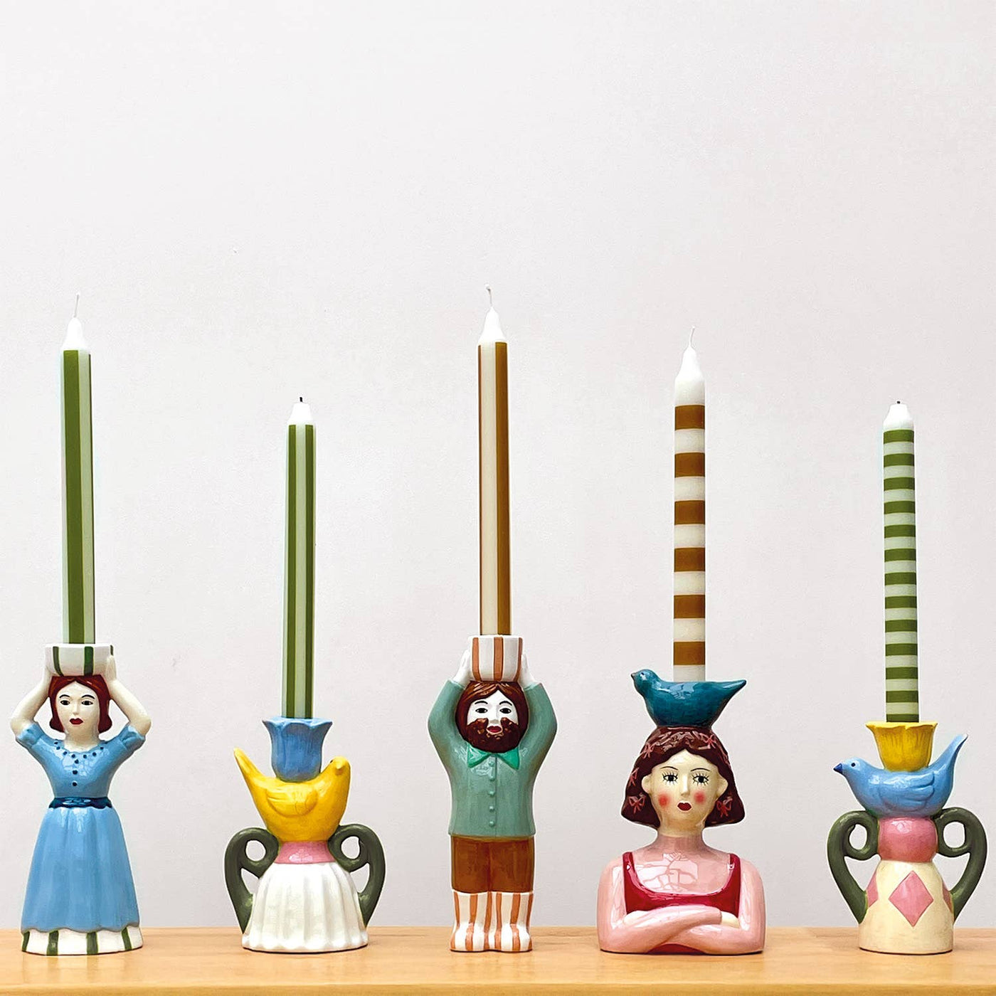 Candelabro niña L12,8 P8,4 H19,6cm