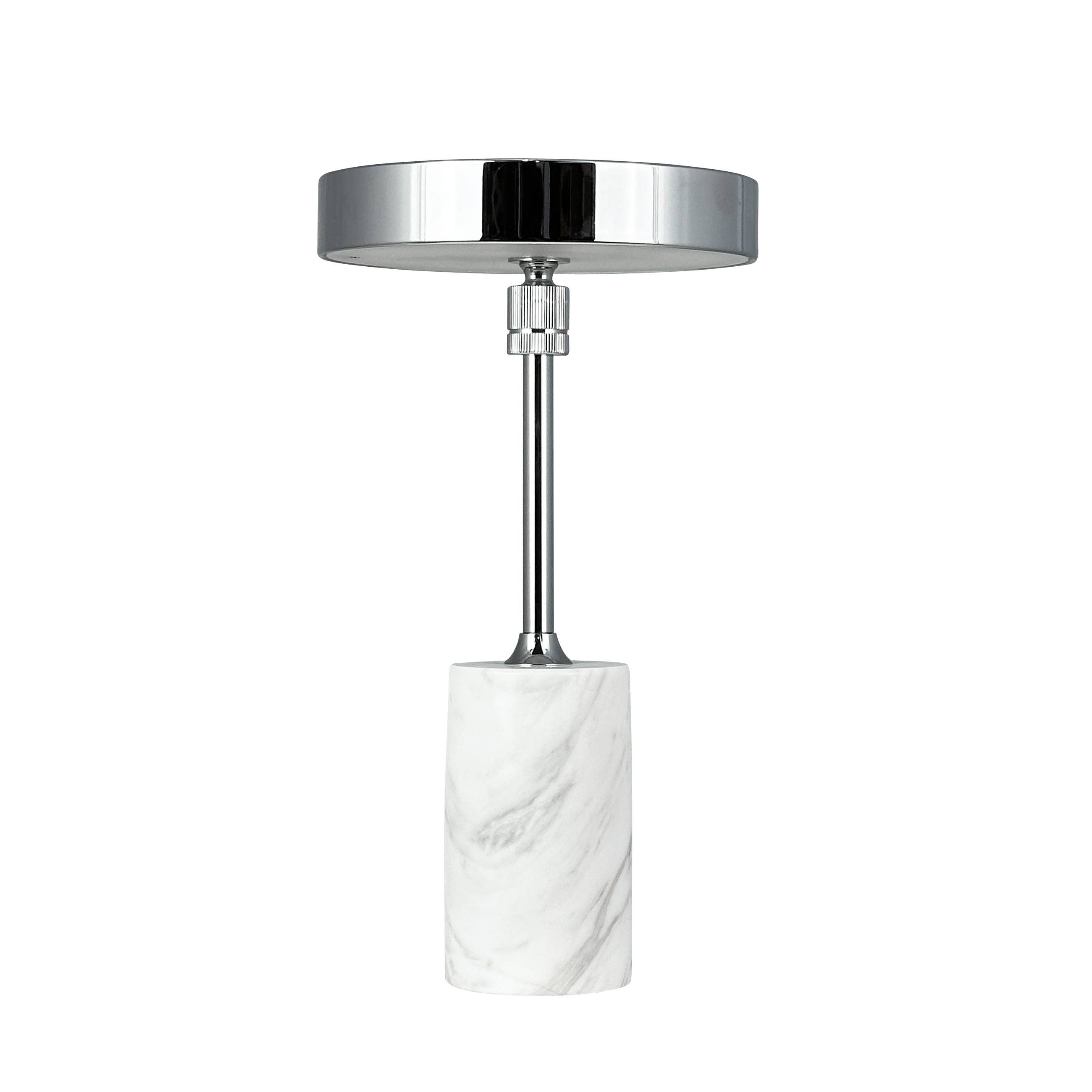 Lámpara de mesa recargable LED Starlight con base de mármol blanco y acabado cromado en Tilda Deco